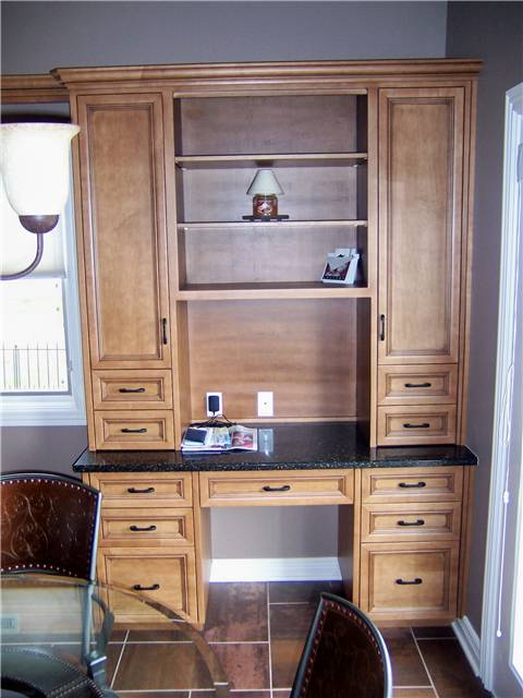 Maple desk with upper display and storage cabinets